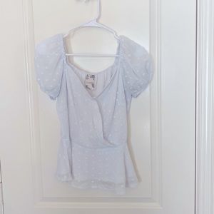 White shirt sleeve peplum top.